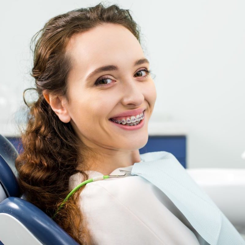 Woman in braces with a healthy smile in El Dorado Hills, California