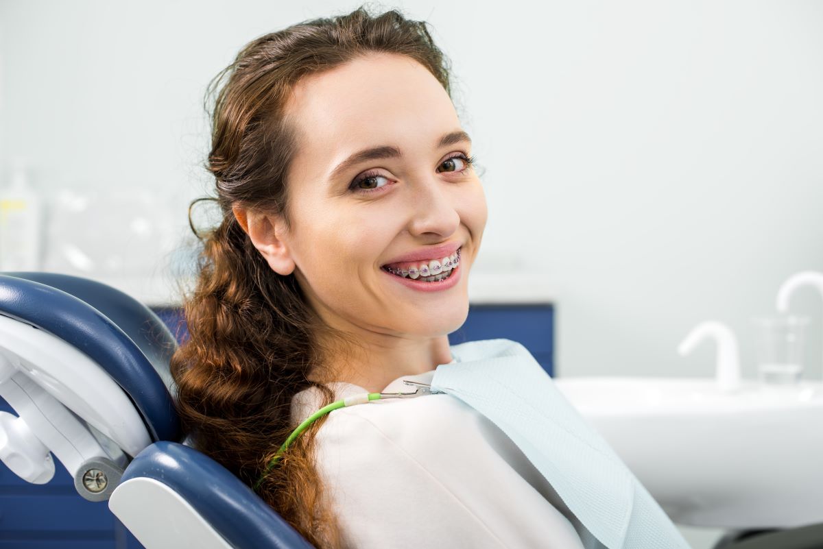 Woman in braces with a healthy smile in El Dorado Hills, California